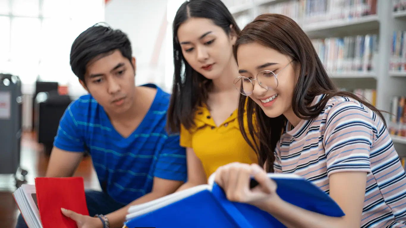 student discussing english materials